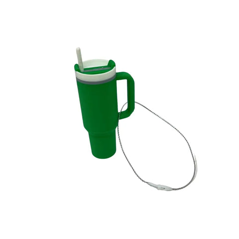 The Chatelet Manufacturing Tumbler Cup Replica Christmas Ornament (2023), a tall green mug-shaped ornament with handle, white lid, straw, attached lanyard, is shown against a plain white background. Made in the USA.