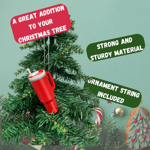 A Tumbler Cup Replica Christmas Ornament by Chatelet Manufacturing hangs on a tree with Strong and sturdy material, ornament string included text. Holiday decor is visible in the background. Made in USA, 2023 popular water bottle replica mug design.