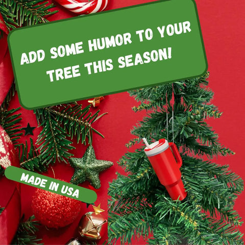 A festive Christmas tree with ornaments and a red Tumbler Cup Replica Christmas Ornament by Chatelet Manufacturing. Green boxes say, Add some humor to your tree this season! and Made in USA on a red background with pine branches.