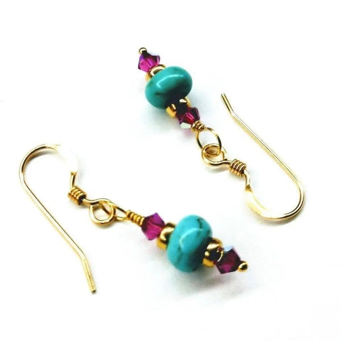 Hot Pink and Turquoise 14K Gold Filled Earrings by Alexa Martha Designs feature turquoise beads with faceted magenta Swarovski crystals in a simple, elegant design against a white background.