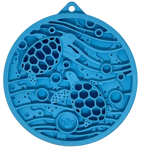 The SodaPup Turtle Emat-Mini Enrichment Lick Mat features a blue circular silicone design with two sea turtles, abstract waves, h2o, suction cups for stability, and a loop for hanging.
