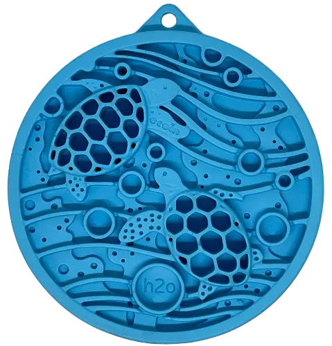 The SodaPup Turtle Emat-Mini Enrichment Lick Mat features a blue circular silicone design with two sea turtles, abstract waves, h2o, suction cups for stability, and a loop for hanging.