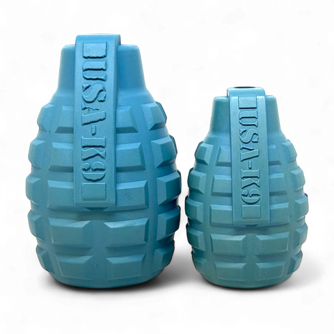 Two Steel Blue USA-K9 Grenade Chew Toys by SodaPup are shown on a black background—one larger than the other. These durable rubber toys work as treat dispensers, reward toys, tug toys, and retrieving toys.