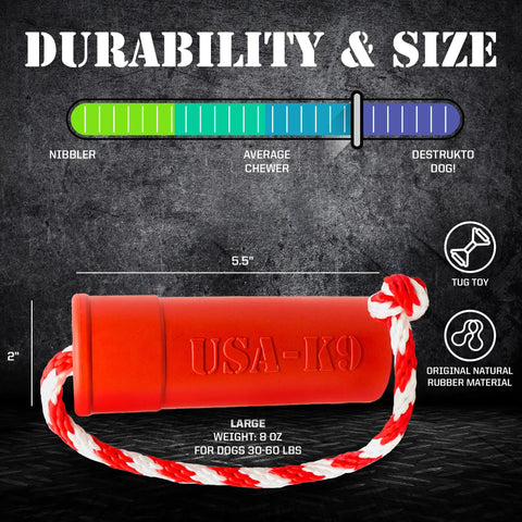 The SodaPup USA-K9 Firecracker Durable Rubber Floating Training Dummy - Large, in red, with a white and red rope, measures 5.5 long and 2 wide, weighs 8 oz, is vet-approved for strong chewers and dogs weighing 30–60 lbs.