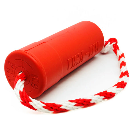 The USA-K9 Firecracker Durable Rubber Floating Training Dummy (Large, Red) by SodaPup features a red cylindrical design with a braided rope loop and is veterinarian approved for durability and floatability.