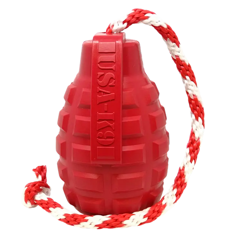 The SodaPup USA-K9 Grenade Durable Rubber Dog Chew Toy, made in the USA, features a textured red grenade-shaped design on a red and white braided rope—ideal for power chewers and doubles as a treat dispenser.