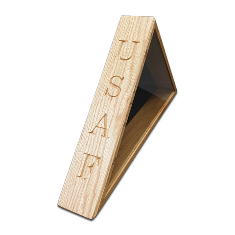 The Legacies of America Woodworking Company’s USAF - Oak Burial Flag Display Case (5 x 9.5) is handcrafted by U.S. veterans, featuring a glass front, USAF engraving, and a triangular oak design—perfect for displaying an American flag memorial.