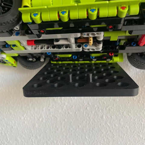 Showcase your LEGO Technic racecar with Chatelet Manufacturings Universal Wall Display—this Made in USA side profile mount features pegs that securely fit into your model for a sleek, stylish display.