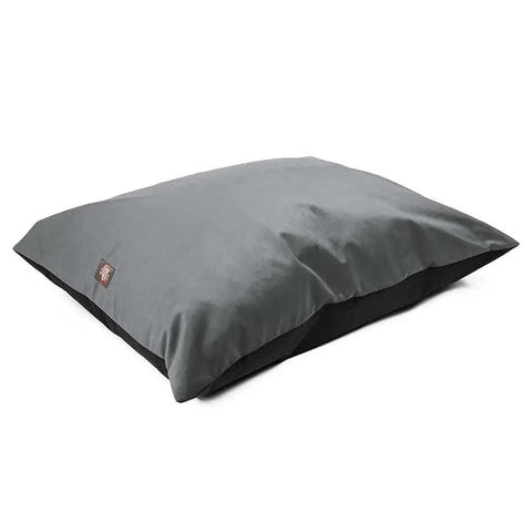 A large, rectangular gray Velvet Super Value Dog Bed by Majestic Pet featuring a small fabric tag on one side, set against a white background. This durable pet bed offers both comfort and lasting quality.