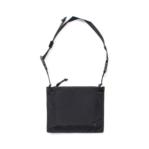 The MIS 2 Way Pouch - Black is a rectangular nylon shoulder bag with an adjustable strap and a subtle logo tag in the corner. Water-resistant and ideal for daily essentials, its shown on a white background.
