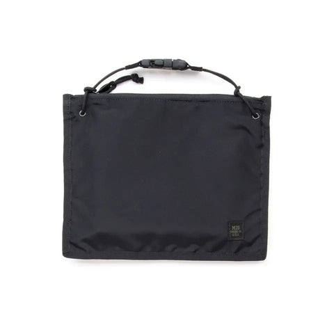 The MIS 2 Way Pouch - Black is a water-resistant rectangular clutch with a small logo tag at the bottom right and a short adjustable strap with a plastic buckle, designed for everyday use.