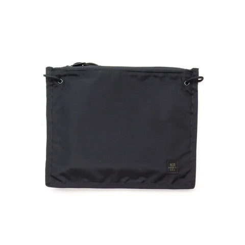 The MIS 2 Way Pouch - Black is a water-resistant rectangular fabric pouch with a zipper and a small black label at the bottom right. Its simple, minimalistic design and smooth surface make it ideal for everyday essentials.