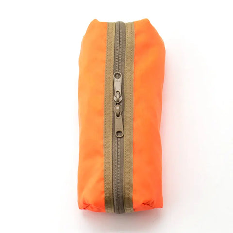 A 3 Way Brief Bag - Chocochip Desert Camo by MIS, featuring a desert camo pattern and vertical brown zipper, is displayed on a white background.