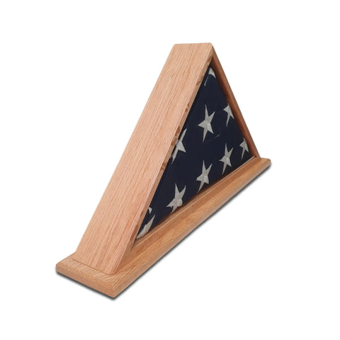 The Legacies of America Woodworking Company Oak Burial Flag Display Case holds a 5x9.5 folded American flag, honoring military service. Crafted from oak and proudly made in the USA.