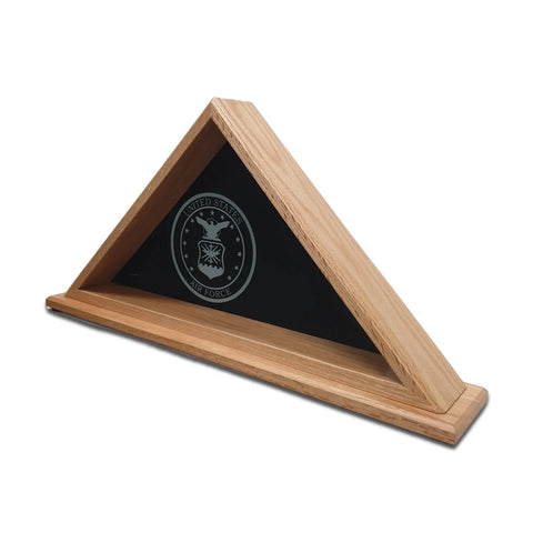 The Legacies of America Woodworking Company Oak Burial Flag Display Case (5 X 9.5) features a glass front and displays the U.S. Air Force emblem. Built by veterans in the USA, it honors your folded American flag with pride.