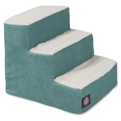 The Majestic Pet Villa 3 Step Pet Stairs (Heavy Duty) feature teal sides and soft, white textured steps to help small or elderly pets reach higher surfaces. The Majestic Pet logo appears on the lower right side.