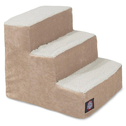 The Majestic Pet Villa 3 Step Pet Stairs (Heavy Duty) feature beige and white fleece covering, helping small or elderly pets reach high surfaces safely. The bottom step displays the Majestic Pet logo patch.