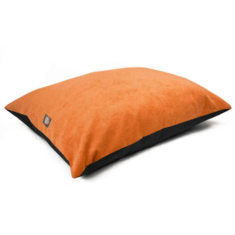 The Majestic Pet Villa Super Value Dog Bed is a rectangular, orange and black bed with a soft, suede-like poly-cotton cover and a small side tag, shown on a plain white background. This dog bed is machine washable for easy cleaning.