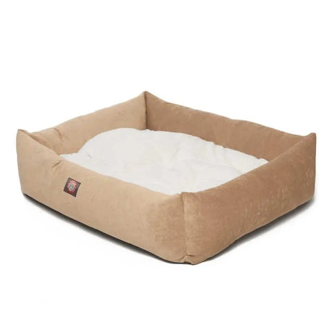 The Majestic Pet Villa Luxe Bagel Bed is a rectangular, tan dog bed with high soft sides and a white cushioned interior, shown on a plain white background.