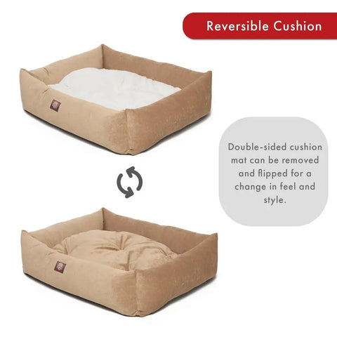 The Villa Luxe Bagel Bed by Majestic Pet is a tan, rectangular, machine-washable dog bed featuring a removable cushion that reverses from white to tan. Flip the cushion for a new look and feel—arrows highlight its reversible function.