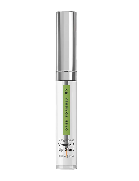 A clear tube of Vitamin E Lip Gloss from Open Formula with a shiny silver cap and green accent, labeled 2 Ingredient Vitamin E & Castor Oil Lip Gloss, 0.3 fl oz | 10 ml.