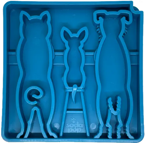 The SodaPup Waiting Dogs Design ETray Enrichment Tray for Dogs features three dog-shaped cut-outs for use as cookie cutters, molds, or a slow feeder lickmat. The blue tray includes the SodaPup logo at the bottom.