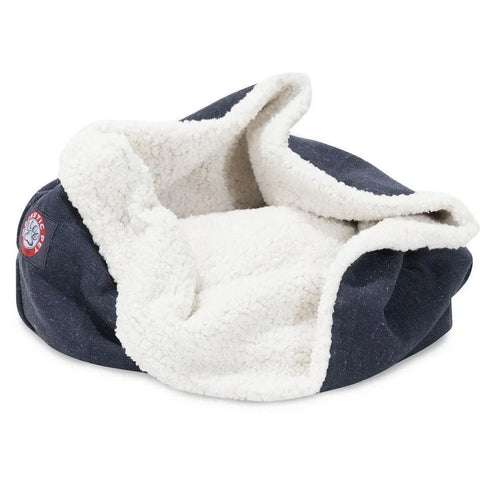 The Wales Burrow Cat Bed by Majestic Pet features a cozy navy blue design, soft Sherpa interior, and circular logo patch—plush and inviting, its perfect for small pets to snuggle in.