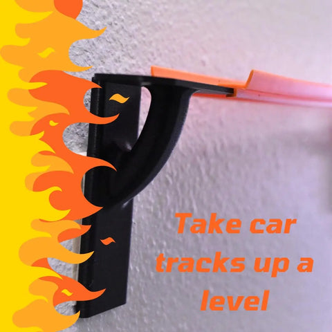 A Chatelet Manufacturing Toy Racetrack Wall Connector, compatible with Hot Wheels, attaches to your wall to hold ramp racecar tracks up high. Decorated with yellow-orange flames and the text Take car tracks up a level. Made in USA.