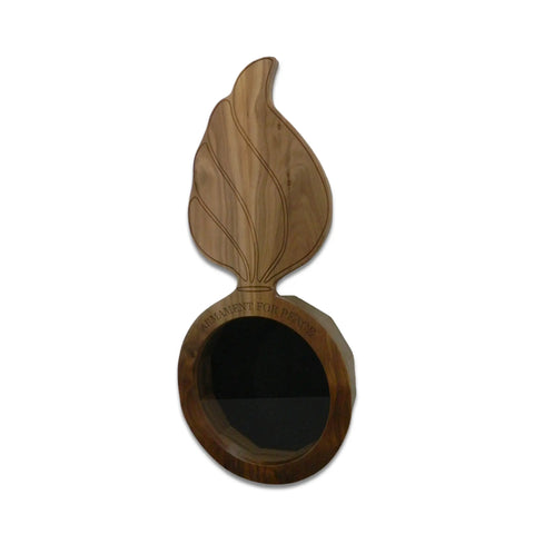 The Walnut Ammo Pisspot Shadow Box by Legacies of America Woodworking Company is a round Walnut Hardwood piece with a large flame design, engraved ASHAMED FOR PERISH above the opening. Expertly crafted in the USA.