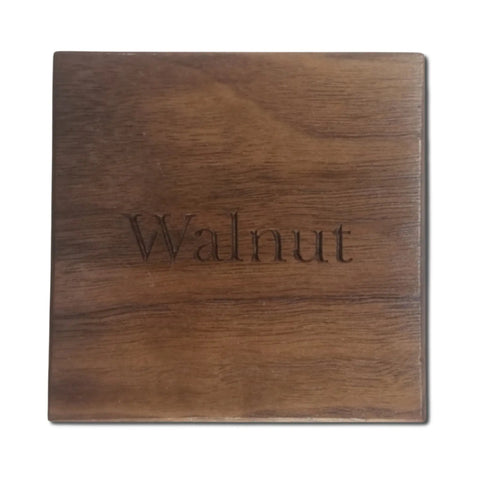 The Walnut Ammo Pisspot Shadow Box by Legacies of America Woodworking Company features a square walnut hardwood sample with a smooth finish, engraved Walnut in the center, rich brown color, visible grain, and is made in the USA.