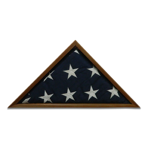 A folded American flag with white stars on blue is displayed in the Legacies of America Woodworking Company Walnut Burial Flag Display Case (5 x 9.5), proudly made in the USA.