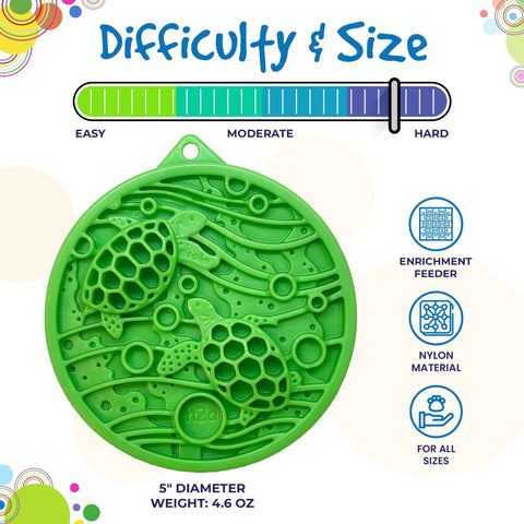 The SodaPup Water Nylon ECoin Durable Enrichment Snacking Coin is a green, round feeder featuring a raised sea turtle design, ideal for holding peanut butter and curbing problem chewing. Made of nylon, its suitable for all sizes; difficulty level is near hard.