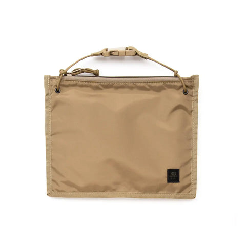 The MIS 2 Way Pouch in Coyote Tan is a rectangular, water-resistant bag with a small black label and an adjustable cord with toggle—ideal for use as a tablet clutch or nylon shoulder bag.