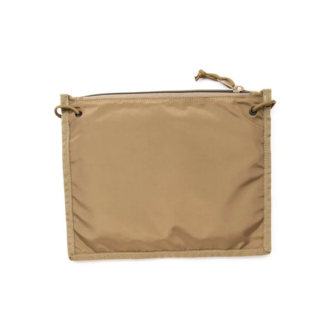 The MIS 2 Way Pouch in Coyote Tan is a flat, rectangular tablet clutch made from durable, water-resistant fabric, featuring a top zipper closure, reinforced corners with small loops on each side.