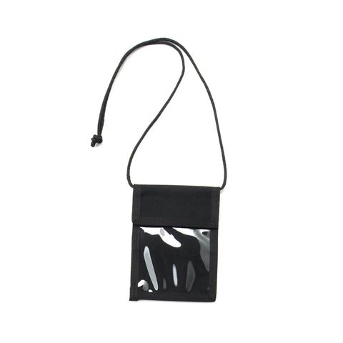 The MIS ID Passport Case - Black is a compact neck pouch made from water-resistant Cordura nylon, with an adjustable strap and clear front pocket—perfect for IDs, badges, or use as a passport holder.