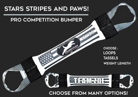 The Bulletproof Pet Products Inc Dock Diving Bumper Tug - Competition Series Weighted in Stars Stripes & Paws design, featuring end loops and custom options, is shown on a dark background to promote advanced dog tug training.