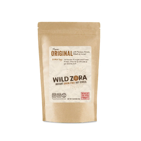 A brown resealable pouch of Wild Zora Instant Cereal - Original With Almonds, Walnuts & Coconut 10-Pack, a healthy breakfast featuring seeds, nuts, coconut, and fruit. This grain-free cereal is sweetened only with fruit.