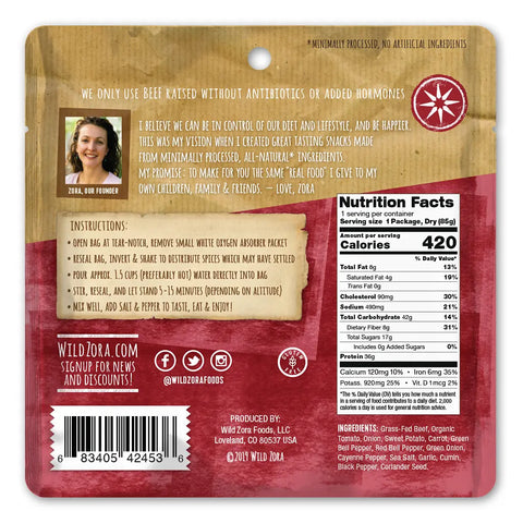 Back of a Wild Zora Meals to Go - All Flavors Variety 7-Pack shows instructions, founder’s note with photo (upper left), nutrition facts, social media icons, barcode, and contact info. Features freeze-dried paleo meals with grass-fed beef.
