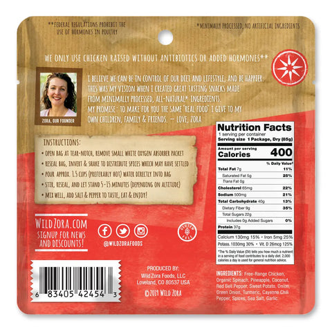 Back of a Wild Zora Meals to Go - All Flavors Variety 7-Pack package displays nutrition facts, ingredients, instructions, founder’s note, and social media info on a tan background with red accents highlighting their freeze-dried paleo meals.