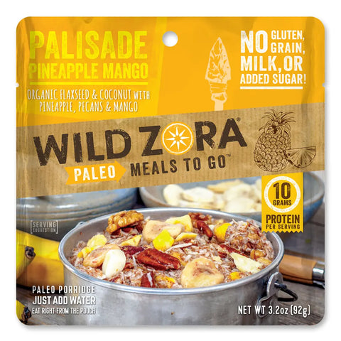 Wild Zora Meals to Go - Palisade Pineapple Mango (Vegan) is a single-serve meal with pecans, pineapple, and coconut. Gluten-free and grain-free, it delivers 10g protein per serving.