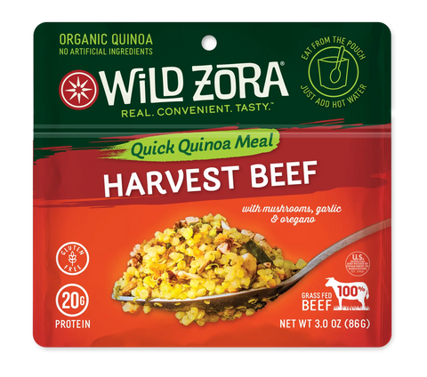 A Wild Zora Quinoa Meals – Harvest Beef With Mushrooms, Garlic & Oregano pouch offers organic quinoa, grass-fed beef, and veggies, with 20g protein and eat-from-the-pouch convenience featured on the packaging.