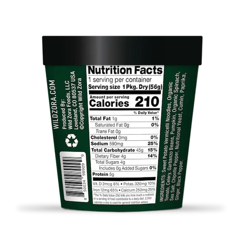A green Wild Zora Vermicelli Noodle Soup, Vegan Enchilada (Single) container with 210 calories per serving, ingredients, allergen info, gluten-free noodles, and wildzora.com on the label.