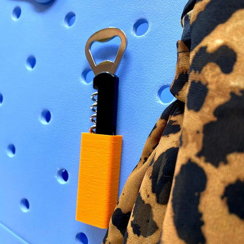 The Chatelet Manufacturing BOGLETS Wine & Bottle Opener Charm attaches to your Bogg Bag, letting you keep a handy corkscrew with stylish flair—perfect for your tote and compatible with other accessories.