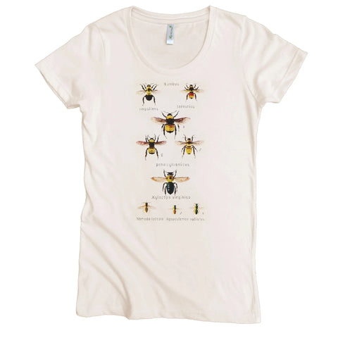 The Spiritex Latin Bee Graphic Tee (W) is a white womens top made from soft organic cotton, featuring a grid of detailed bee illustrations with scientific names on the front.