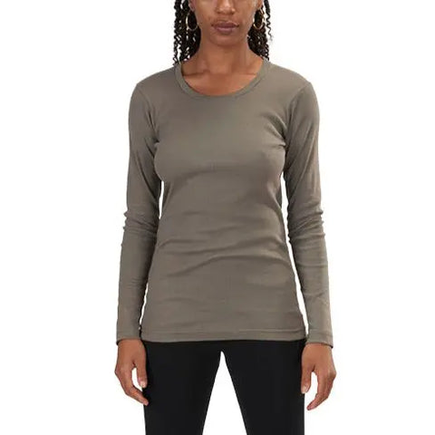 A woman stands facing forward against a plain white background, wearing a fitted olive green Long Sleeve Perfect Crewneck Tee from Spiritex | Sustainable Apparel and black pants.