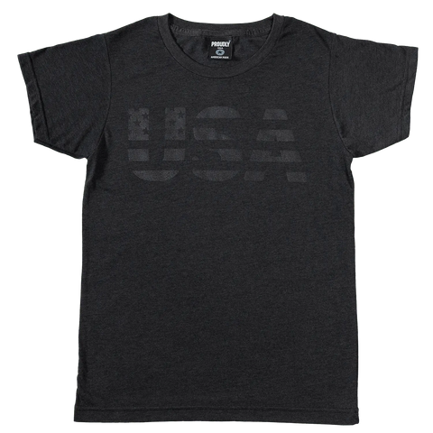 The Proudly USA Patriotic USA Womens TriBlend T-Shirt (Heather Black) features USA in bold, faded letters on the chest, with the U styled in an American flag stars and stripes design.