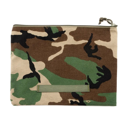 The MIS Tool Pouch L features durable Cordura nylon in a woodland camo pattern of green, brown, black, and tan, shown against a white background.