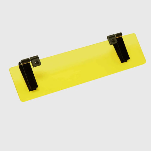 The Glare Guard Yellow Polarized Car Visor Extender features two black clips on top and is designed to reduce glare and improve contrast, shown against a plain light gray background.