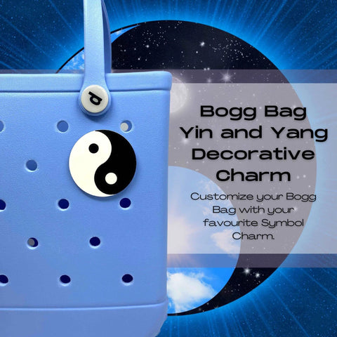 A blue tote bag with a Yin and Yang charm by Chatelet Manufacturing, set against a cosmic background. Text: BOGLETS - Yin and Yang Charm compatible with Bogg Bags, Simply Southern & similar tote bags. Customize your style!.