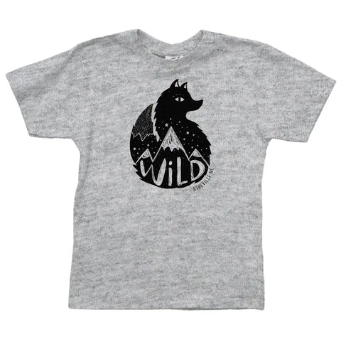 The Asheville Wild Fox Graphic Tee by Spiritex | Sustainable Apparel is a heather gray organic cotton youth shirt with a bold black fox, mountains, and stars graphic, plus “WILD” below for an adventurous look.